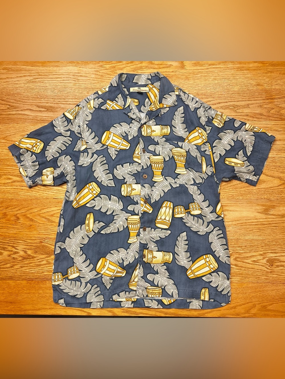 Tommy Bahama VTG Blue Hawaiian Shirt with Tan Drum Print. 100% Silk.